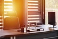 Business office workplace. Sunlight at work place for chief, boss or other employees. Table and comfortable chair. Light through Royalty Free Stock Photo