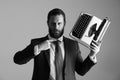 Business in the old manner. business man in blue suit and tie with typewriter Royalty Free Stock Photo