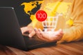 Business online shopping and e-commerce delivery. Hand holding shopping cart icon with internet technology concept. O Royalty Free Stock Photo