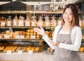 Business owner with bakery shop background Royalty Free Stock Photo