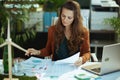 business owner woman in green office working with documents Royalty Free Stock Photo