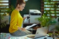 business owner woman in green office working with documents Royalty Free Stock Photo