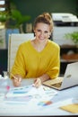 business owner woman in green office working with documents Royalty Free Stock Photo