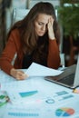 business owner woman in green office working with documents Royalty Free Stock Photo