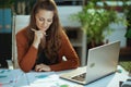 business owner woman in green office working with documents Royalty Free Stock Photo