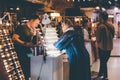 Business owners and shoppers at local market, small business. 07.14.2023 St.-Petersburg , Russia.