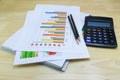 business paper graphs calculator pencil with charts report, concept financial planning Royalty Free Stock Photo