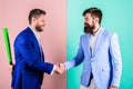 Business partners competitors office colleagues shaking hands. Tricky first impression. Do not trust him. Hidden danger Royalty Free Stock Photo