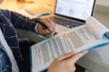 Business partners concept a young male entrepreneur signing a signature on the contract with a big company Royalty Free Stock Photo