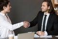 Business partners handshaking after closing successful deal Royalty Free Stock Photo