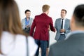 Business partners handshaking with leader Royalty Free Stock Photo