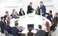 Business partners shake hands at the talks near the round table Royalty Free Stock Photo