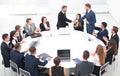 Business partners shake hands at the talks near the round table Royalty Free Stock Photo