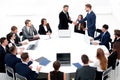 Business partners shake hands at the talks near the round table Royalty Free Stock Photo