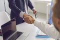 Business partners shaking hands, confirming collaboration and financial agreement Royalty Free Stock Photo