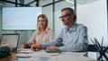 Business partners shaking hands indoors closeup. Happy people signing contract Royalty Free Stock Photo