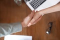 Business partners shaking hands over table after meeting Royalty Free Stock Photo