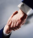 Business partners after signing agreement. Partnership, friendship and financial support. Royalty Free Stock Photo