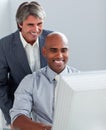 Business partners working at a computer Royalty Free Stock Photo