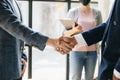 Business partnership handshake concept.Photo two coworkers handshaking process.Successful deal after great meeting. in office Royalty Free Stock Photo