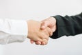 Business partnership meeting. Picture businessmans handshake. Successful businessmen handshaking after good deal.