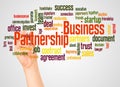 Business partnership word cloud and hand with marker concept Royalty Free Stock Photo