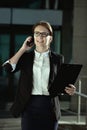 Business peolple concept- successful business woman talking on smartphone.