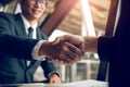 Business people accept or confirm project on the proposal and join shaking hands at office room company Royalty Free Stock Photo