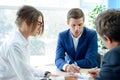 Business People Analyzing Financial Results on Graphs around the Table in Modern Office. Team Work Concept Royalty Free Stock Photo