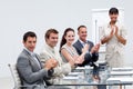 Business people applauding a colleague Royalty Free Stock Photo