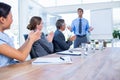 Business people applauding during a meeting Royalty Free Stock Photo