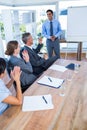 Business people applauding during a meeting Royalty Free Stock Photo