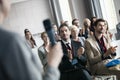 Business people applauding for public speaker during seminar Royalty Free Stock Photo