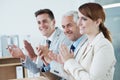 Business people, applause and support for success with praise and audience at presentation or seminar. Clapping hands Royalty Free Stock Photo