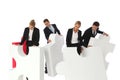 Business people assembling puzzle Royalty Free Stock Photo