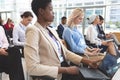 Business people attending a business seminar