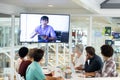 Business people attending video conference at conference room in a modern office Royalty Free Stock Photo