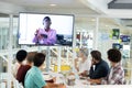 Business people attending video conference at conference room in a modern office Royalty Free Stock Photo