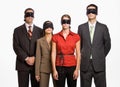 Business people in blindfolds