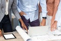 Business people with blueprint on the desk using laptop Royalty Free Stock Photo