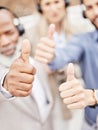 Business people, call center and hands with thumbs up for winning, teamwork or agreement at office. Hand of group Royalty Free Stock Photo