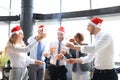 Business people are celebrating holiday in modern office drinking champagne and having fun in coworking Royalty Free Stock Photo