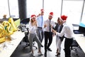 Business people are celebrating holiday in modern office drinking champagne and having fun in coworking Royalty Free Stock Photo