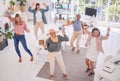 Business people, celebration and dancing in corporate success for teamwork collaboration at the office. Group of Royalty Free Stock Photo