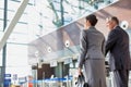 Business people checking their bags in airport