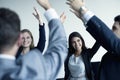 Business people cheering with arms in the air Royalty Free Stock Photo