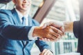 Business people colleagues shaking hands during a meeting to sign agreement for New Partner Planning Strategy Analysis Concept Royalty Free Stock Photo