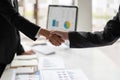 Business people colleagues shaking hands during a meeting to sign agreement for New Partner Planning Strategy Analysis Royalty Free Stock Photo