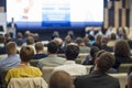 Business People Concept and Ideas. Large Group of People at the Conference Watching Presentation Charts on Screen Royalty Free Stock Photo