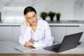 Business and people concept - stressed or tired young woman with laptop computer working at home office Royalty Free Stock Photo